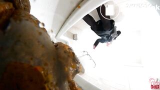 Japanese shitting on toilet.