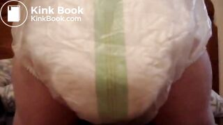 Mature woman pooping and peeing in her large diaper