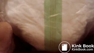 Mature woman pooping and peeing in her large diaper