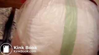 Mature woman pooping and peeing in her large diaper