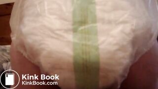 Mature woman pooping and peeing in her large diaper