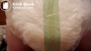 Mature woman pooping and peeing in her large diaper