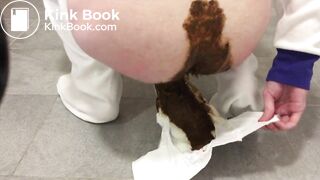 Girl pooping in baby diaper for 2 days