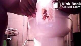 Ebony girl pooping and smearing