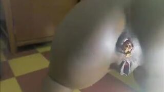 Cute ebony girl rubbing shit on her face