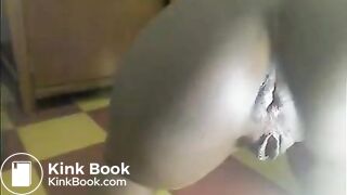 Cute ebony girl rubbing shit on her face