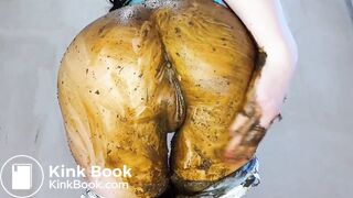 woman shits jeans and smears, puts on a show