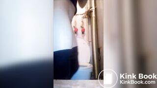 Girl pooping over her toilet