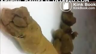 A girls poops underwater