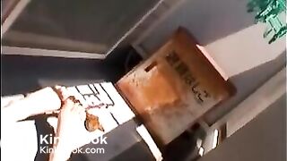 Cute asian girl sunshine shitting at balcony