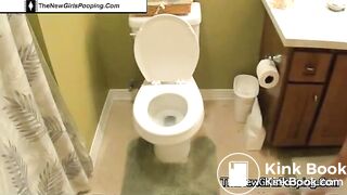 Blonde girl in toilet