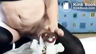 Screwing teddy bear while shitting her panties