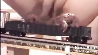 She poops on a toy train