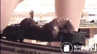 She poops on a toy train
