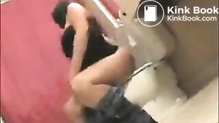 pretty brunette messing up toilet