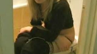 Woman pooping in toilet - video 3