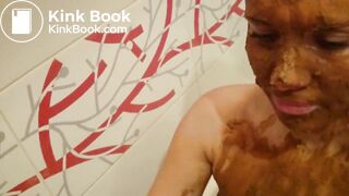 Sucking cock while being smeared in shit