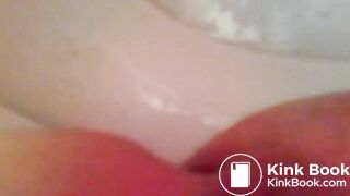 girl giving a big crap on the toilet