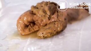 Amateur woman unloads thick long turd