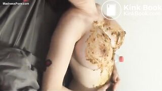 Attractive woman with fake tits rubs in scat