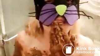 Masked blonde eats scat