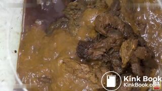 Women filling a glass box with shit