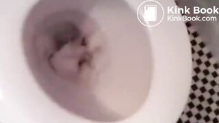 Lovely teen girl on the toilet