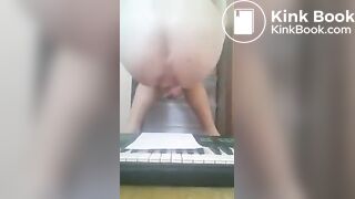 Girl shits on piano