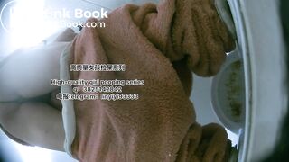 A pretty girl defecates in the toilet 3