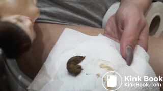 Peeing and shitting on doll