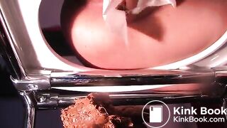 Mistress is shitting into slave's mouth