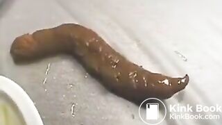 Naked Jap babe manage to poop a long turd in library