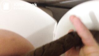 Woman poops perfect turd into her bf's hand