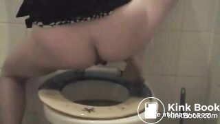 Sexy girl shits in toilet