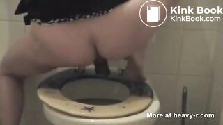 Sexy girl shits in toilet