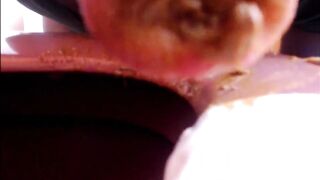 Ebony goddess licks toilet