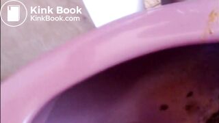 Ebony goddess licks toilet