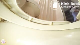 Japanese office worker girl expels in a western style toilet