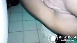 Amateur ebony girl pooping in the public toilet