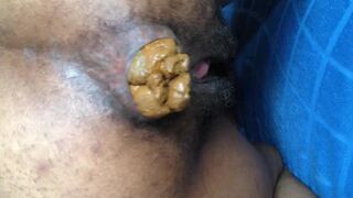Hairy Ebony Pushes out a Fat Turd (HD)