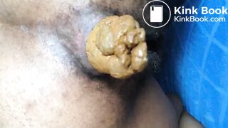 Hairy Ebony Pushes out a Fat Turd (HD)