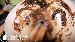 Girl fingers her friend while she shits