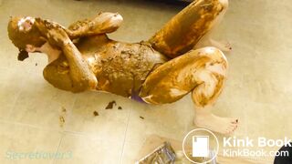 short haired chick plays in shit