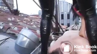 two sexy mistresses are pooping on a chubby slave