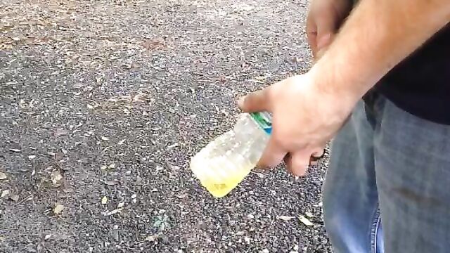 yellow piss into bottle (male)