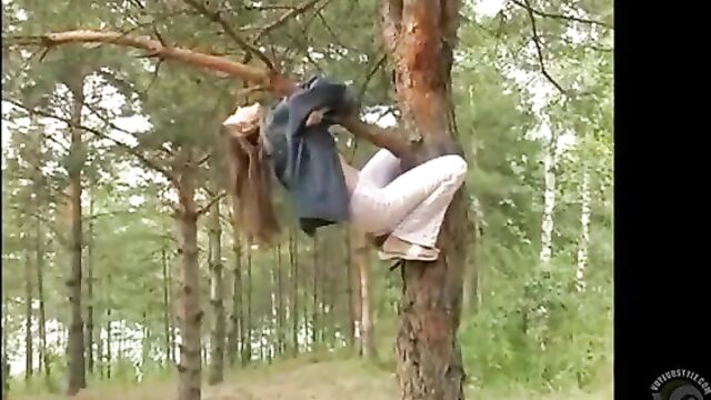 Amateur Brunette Is On A Tree And Peeing