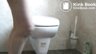 squatting on toilet and pushing out hard turd
