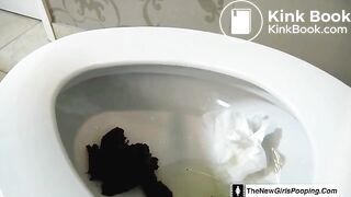 Girl shitting on the toilet