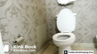 Girl shitting on the toilet