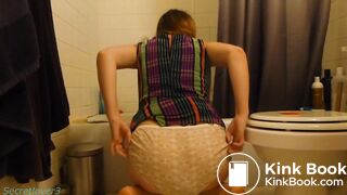 Lovely teen shitting